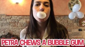 Petra chews a bubble gum - HD