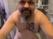Caged slave drinks his own piss in the shower at Sir's request