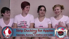 Wet lesbians play stripping apple bobbing game