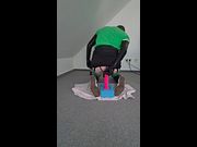 Sub inserts large dildo deep into his ass
