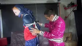 Ronja Tied And Gagged By Stella In Shiny Nylon Rainwear