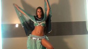 Well shaped girlie dancing seductively in eastern dress
