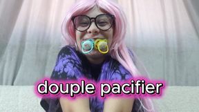 My Stepsister plays with her new pacifier but she can't get enough of one so she immediately takes 2 pacifiers in her mouth and sucks them, then takes turns sucking the pacifiers