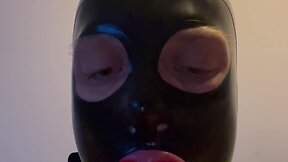 Fetish latex doll sissy femboy with lip gag and mask drools - a touching experience