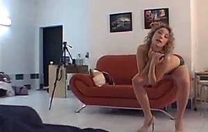 Curly girl with perky natural tits lap dancing and stripping