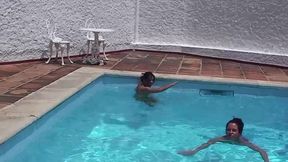 Two gorgeous babes are masturbating by the pool