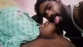 Busty Tamil woman shows off her toned body as she presses on her massive bosom with her ex-wife's body!