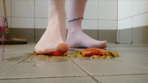 Footplay in pantyhose with fruit