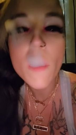 Smoking babe KandyxB with a titty peek, part 2