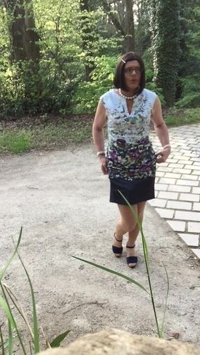 fem-gasm in a summer dress in the forest