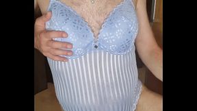 Crossdresser wearing blue st oliver body and mastubating