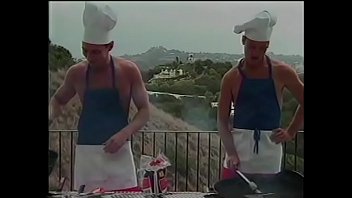 Couple of The Naked Chef Paul Morgan&#039_s assistants Matt Young and Marc Hamilton try to prepare barbeque sausages in their own way