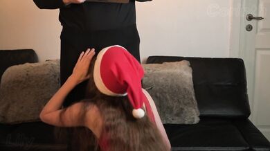 Mrs Santa sucks dark elf hard in red dress while Santa's busy