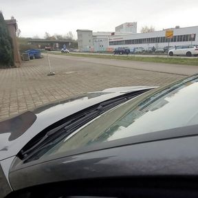 Jerking off next to a road behind my car with traffic going by.