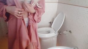 Gorgeous human barbie doll spied in the bathroom