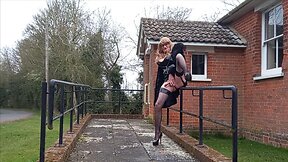 Squirting crossdresser in pvc masturbates outdoors