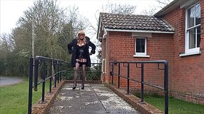 Squirting crossdresser in pvc masturbates outdoors