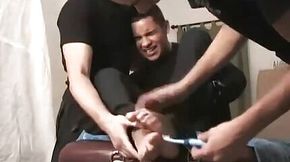 Jock feet restrained and tickled by nasty foot fetishists