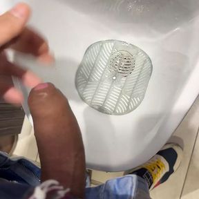 Getting caught playing with my curved dick in a public toilet