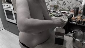With big natural saggy tits, mature housewife bbw milf cooking in the kitchen.