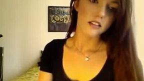 Skinny hot young brunette is stripteasing on webcam