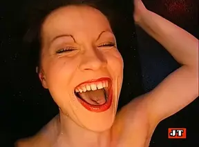 Brunette gets a facial from multiple cocks