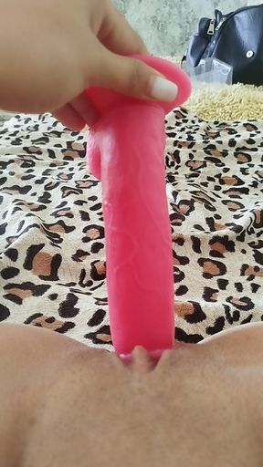 Jerking off sweet pussy with a pink friend
