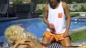 Mesmerizing classic blondie by the pool feeds on a dick