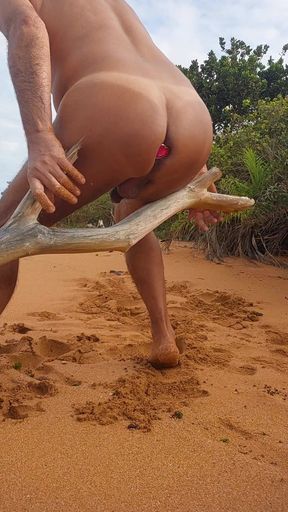 Naked ladysilva on the beach showing off her tanned hot ass with butt plug