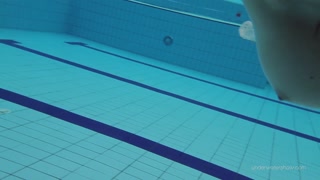 Tight brunette Russian babe Katy Soroka swims