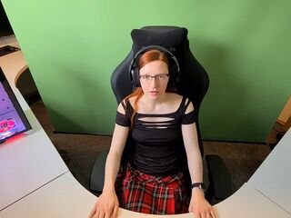 Redhead nerd cutie masturbates hard on stream