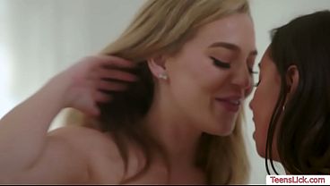 Lesbian women with big asses and tits engage in intimate acts.
