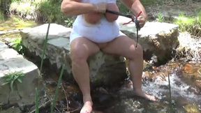 Washing Dirty Tits in a Stream