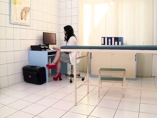 Breasty Golden-haired wench gets fisted hard in the doctors Office