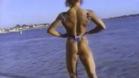 Sportive wrestler chick gives me an interivew on the shore