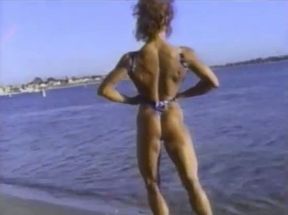 Sportive wrestler chick gives me an interivew on the shore