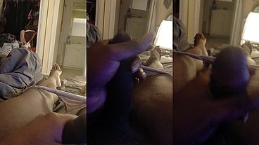 Goonette playing in bed.