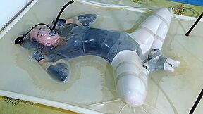 Frogtied In Transparent Vacbed