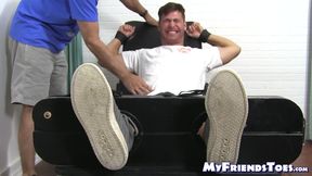 Handsome hunk endures tickling torment from deviant mature