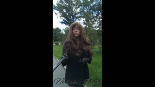 girl in a transparent dress walks near the Moscow University (part 2)