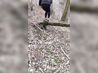 A excited Latvian angel is looking for a place to pee with a large stream of urine.