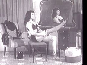 American vintage model Betty Paige performs a sensual dance