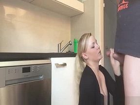 German milf blows and fucks her man hard in the kitchen