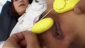 Japanese AV Model gets vibrators on clit and boner on hairy labia
