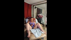 Wet and smoking stepmom plays video games in mini skirt