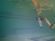 Swimming in clothes underwater
