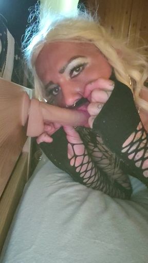 Blonde Sissy Crossdresser sucking dildo