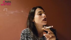 Fabulous brunette likes smoking outdoors