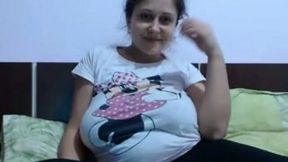 Cute pregnant brunette sweetie flashes her her huge boobs