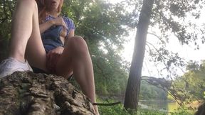 Petite teen redhead masturbates in public near the river